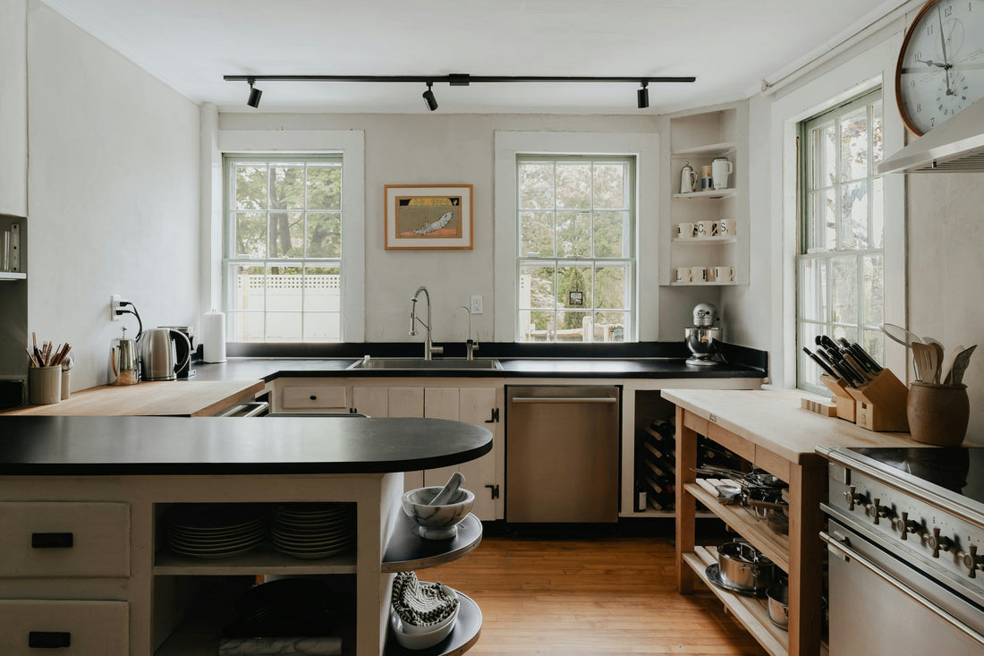 Wide modern kitchen with sink area and organized cabinets, ideal for under sink storage inspiration – NeatNest