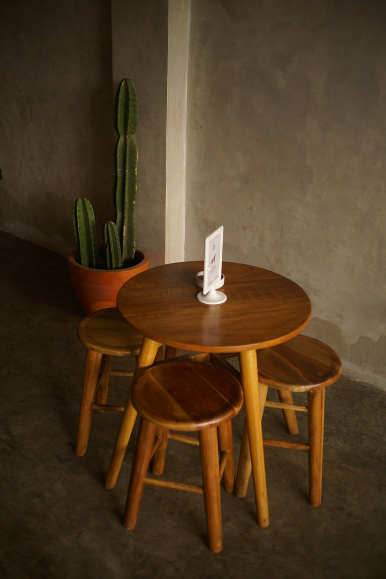 Compact nesting tables and stools for small spaces