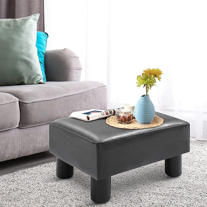 HOMCOM Ottoman Foot Rest, Small Foot Stool with Faux Leather Upholstery, Rectangular Ottoman Footrest with Padded Foam Seat and Plastic Legs, Bright Black